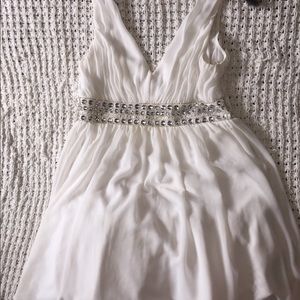 Knee length white formal dress